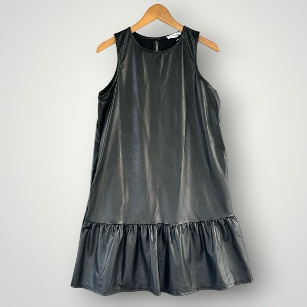 First Love Black Faux Leather Sleeveless Ruffle-Hem Dress